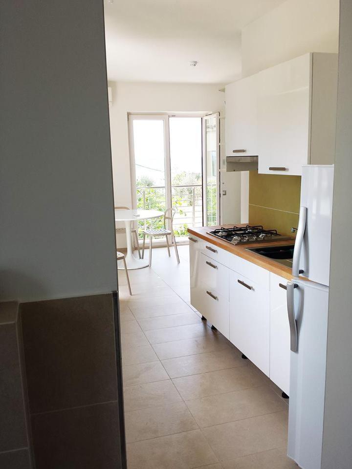 Hotel E Residence Il Faro อักเชียโรลี ภายนอก รูปภาพ